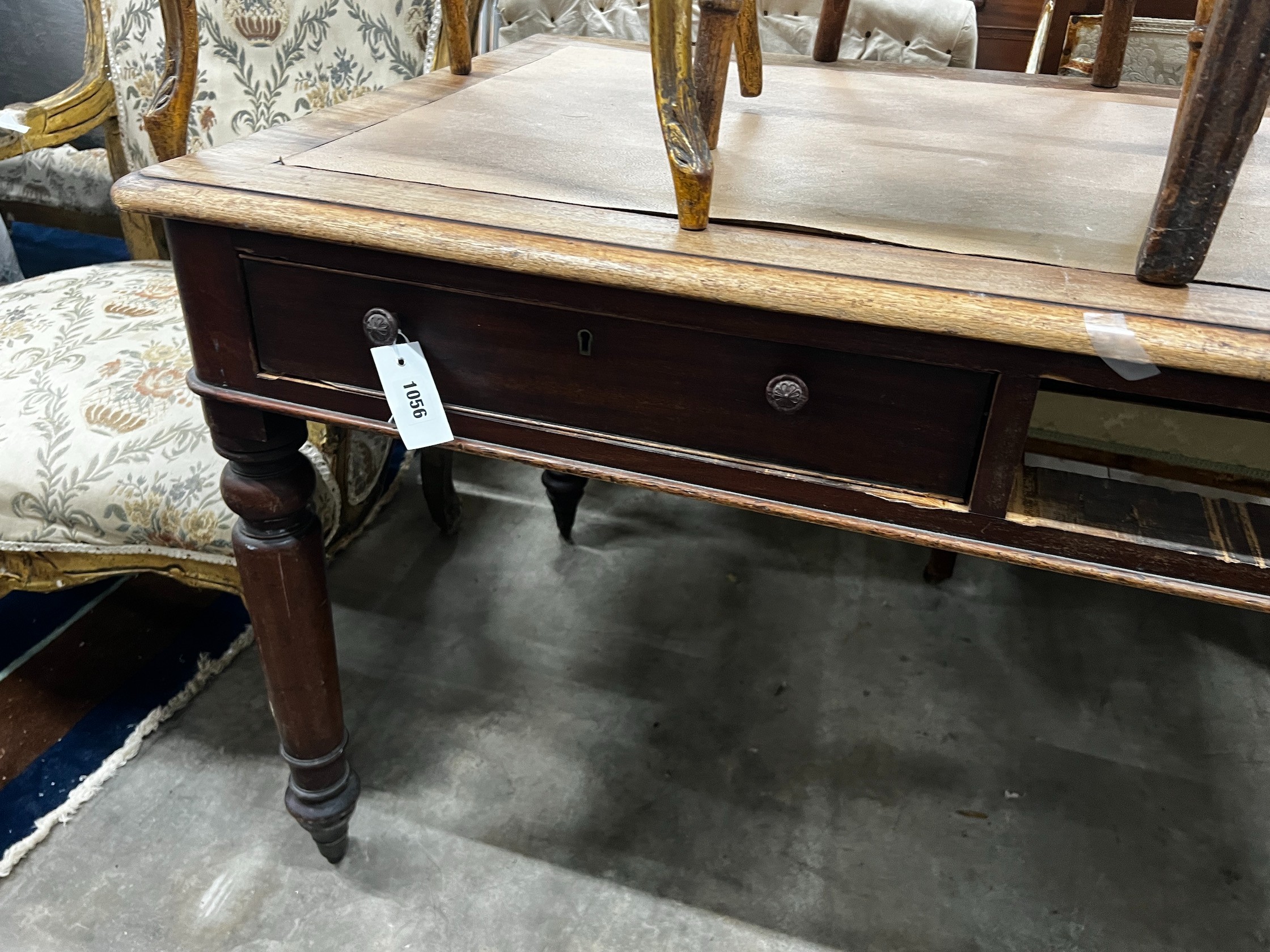 A Victorian mahogany two drawer writing table, width 120cm depth 74cm height 74cm